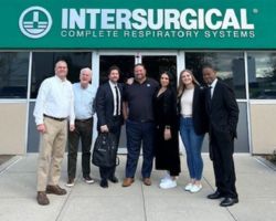 US-website-about-us-outside-office-group-image