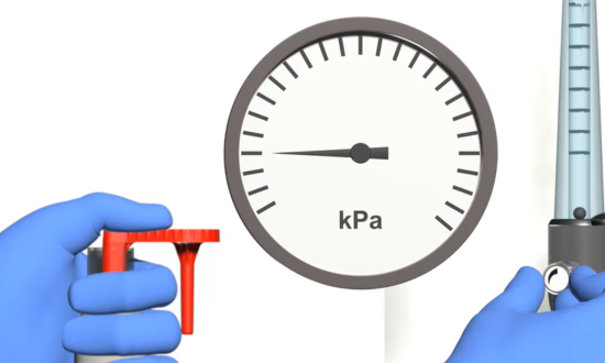 Using an anesthetic breathing system leak tester 